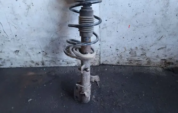 Nissan Note (E11) Front shock absorber with coil spring
