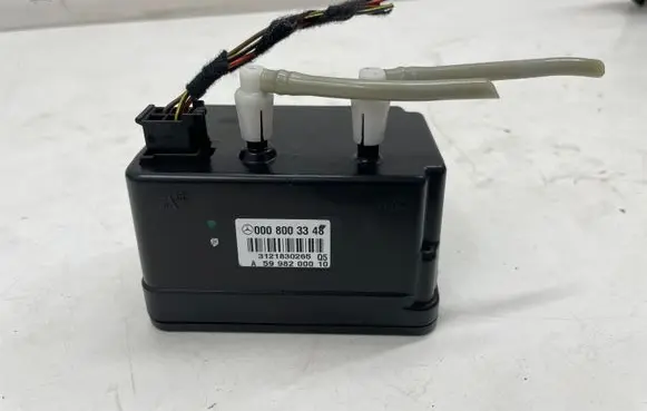 Mercedes-Benz E C207 W207 Central locking vacuum pump 0008003348