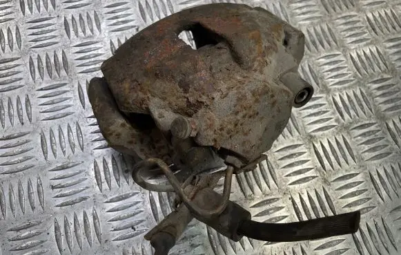 Volkswagen Golf V Front brake caliper