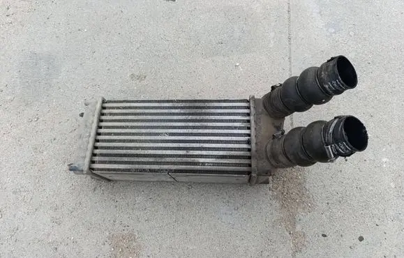 Citroen C4 I Intercooler radiator 9648551880