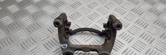 Volkswagen PASSAT B6 Brake caliper pad carrier rear 