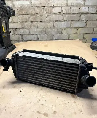 KIA Carens III Intercooler radiator 282702a480
