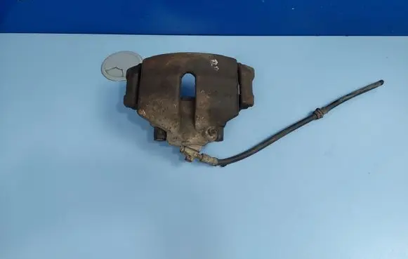 Volkswagen Touran I Front brake caliper 1K0615124E 1K0615125D