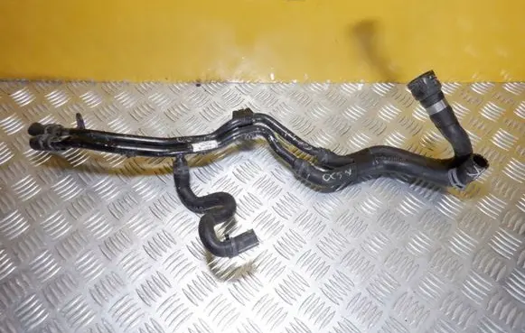 Volkswagen Golf VII Engine coolant pipe/hose 5Q0121065H