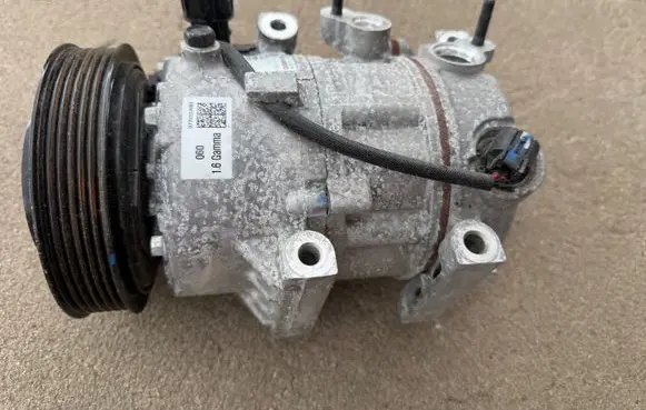 Hyundai Tucson TL Air conditioning (A/C) compressor (pump) 97701D7600