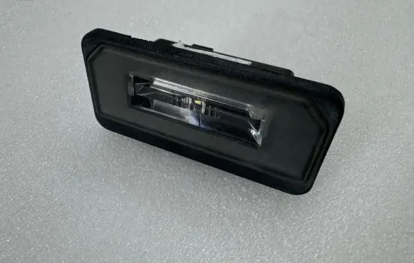 Tesla Model S Number plate light 103434100B 107243 7200204EC