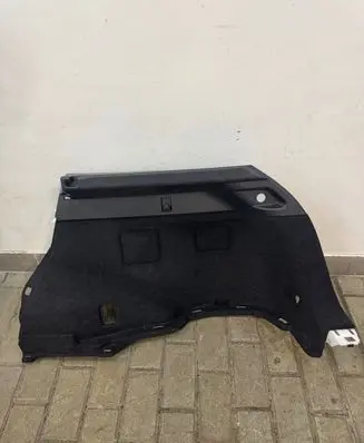 Trunk/boot lower side trim panel