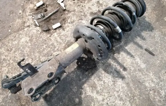 Opel Zafira C Front shock absorber with coil spring 13368505