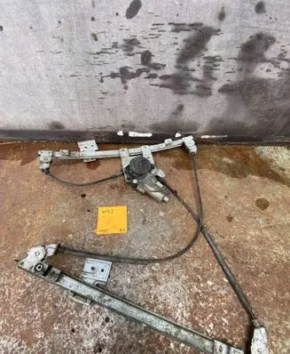 Volkswagen Golf III Front door window regulator with motor 0130821679
