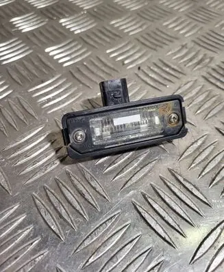 Volkswagen Polo Number plate light 1J6943021B