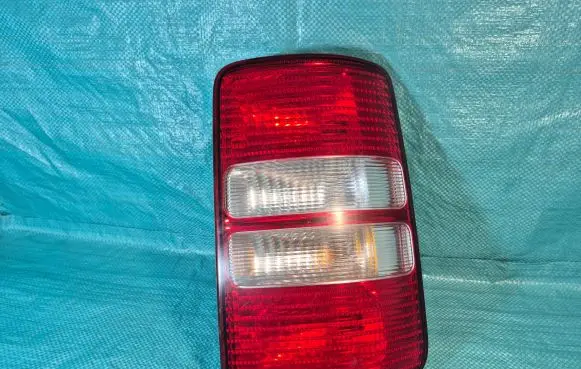 Volkswagen Caddy Rear/tail lights 2K0945112A