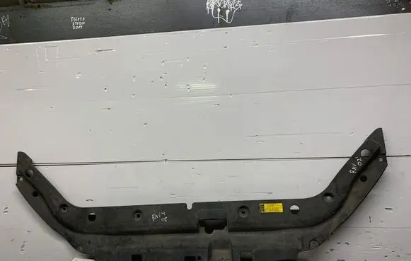 Engine bonnet/hood lock trim molding