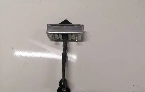 Mazda 6 Front door check strap stopper