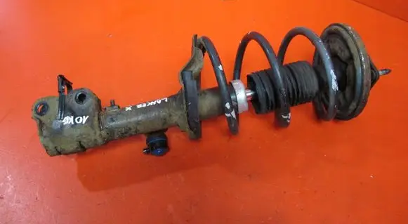 Mitsubishi Lancer X Front shock absorber with coil spring