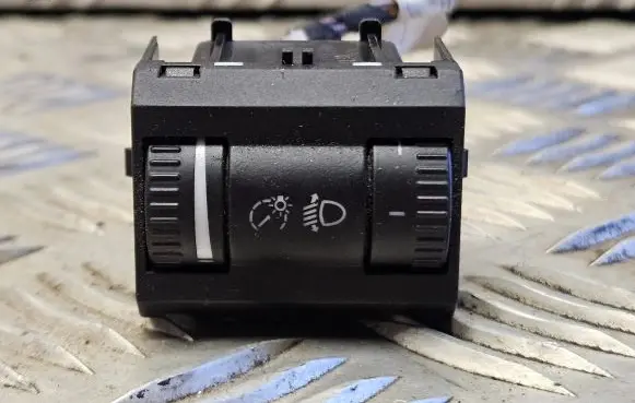 Headlight level height control switch