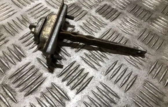 Mazda 626 Front door check strap stopper 
