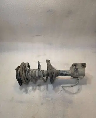 Subaru Legacy Front shock absorber with coil spring 