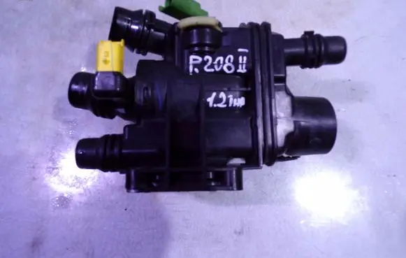 Thermostat/thermostat housing