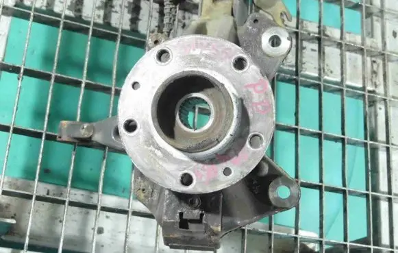 Front wheel hub spindle knuckle
