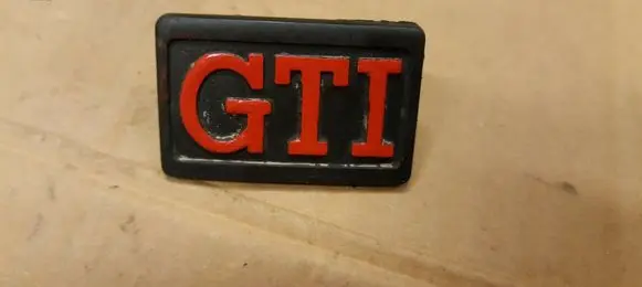 Volkswagen Golf II Fender model badge letters 191853688C