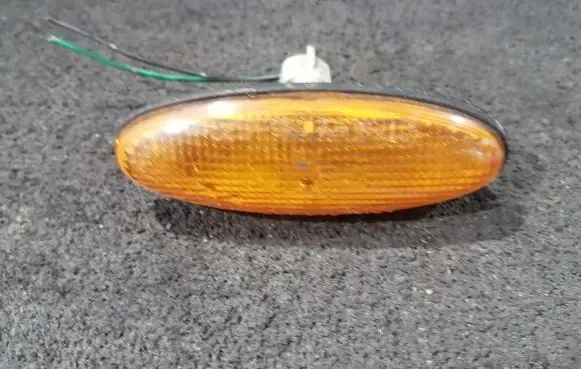 Mazda 323 F Front fender indicator light