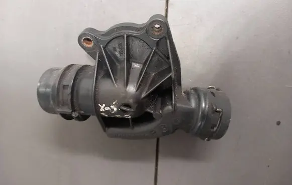 Thermostat/thermostat housing