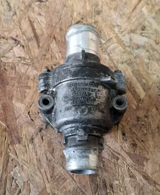 Thermostat/thermostat housing