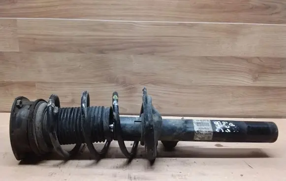 Audi A3 S3 8V Front shock absorber with coil spring 5Q0413023EB