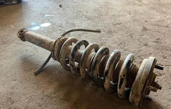 KIA Sorento Front shock absorber with coil spring