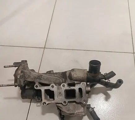 Thermostat/thermostat housing
