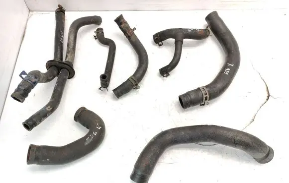 Volkswagen Polo II 86C 2F Engine coolant pipe/hose 030121055 030121061
