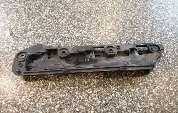 Volkswagen Touran I Rear bumper mounting bracket 1T0807936