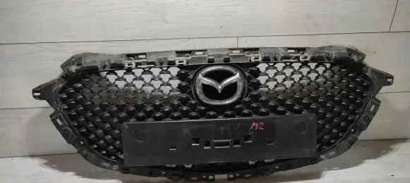 Mazda 2 Front bumper upper radiator grill DHM150719