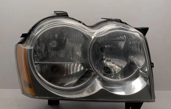Jeep Grand Cherokee (WK) Headlight/headlamp 55156670AI