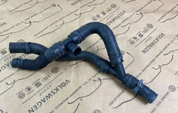 Volkswagen Golf VII Engine coolant pipe/hose 5Q0122086F