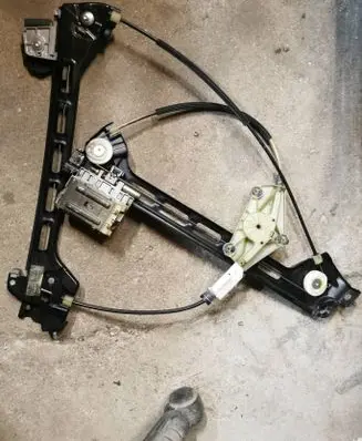 Rear door window regulator with motor