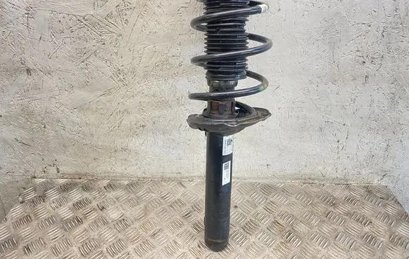 Volkswagen Touran III Front shock absorber with coil spring 5QA413031AB 5QA412021CM