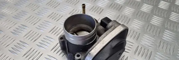 Volkswagen Golf V Throttle valve 06A133062AT A2C53093430