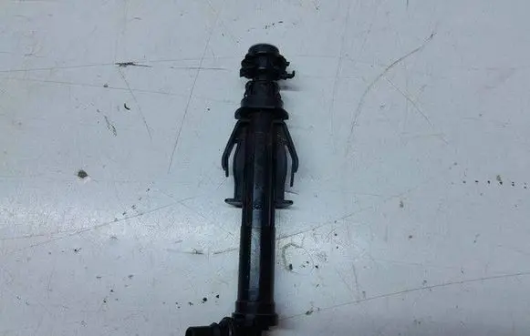 Headlight washer spray nozzle