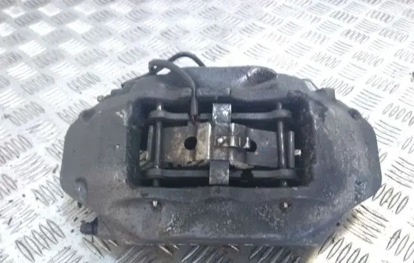 Volkswagen Touareg II Front brake caliper 7P6615106AE