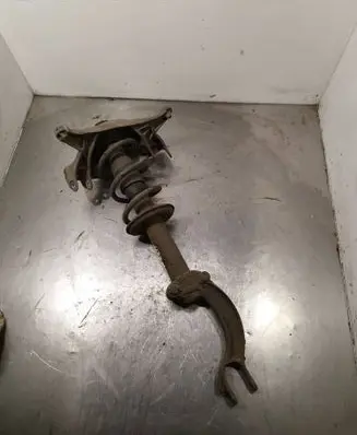 Front shock absorber with coil spring