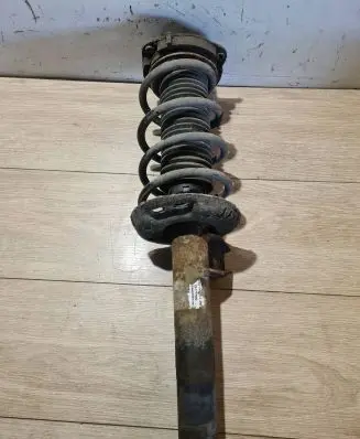 Volkswagen Golf VI Front shock absorber with coil spring