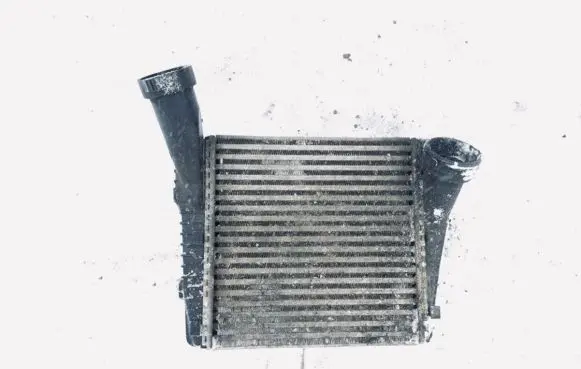 Volkswagen Touareg I Intercooler radiator 7L0145803A b5418
