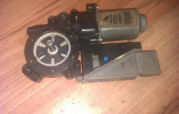Front door window regulator motor