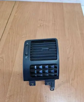 Volkswagen Touran I Dash center air vent grill 1T0819703B