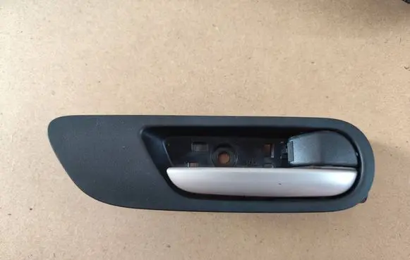 Mazda 3 II Front door interior handle