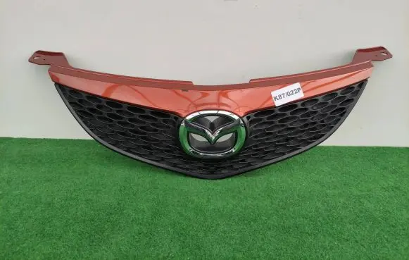 Mazda 3 I Front bumper upper radiator grill BN8V50711