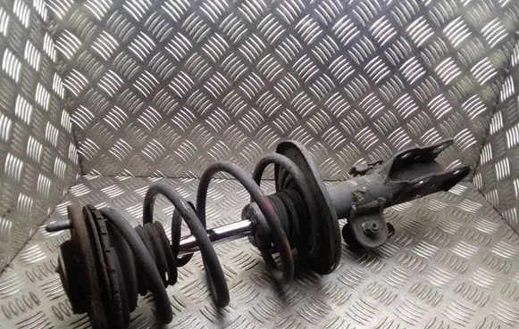 Front shock absorber with coil spring