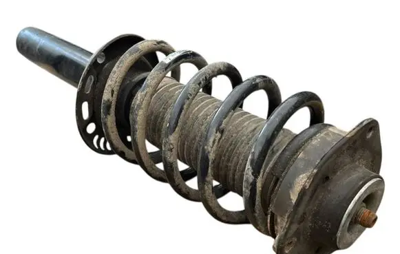 Volkswagen Caddy Front shock absorber with coil spring 317575 824904013020