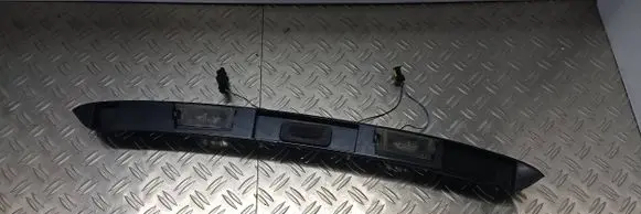 Trunk door license plate light bar